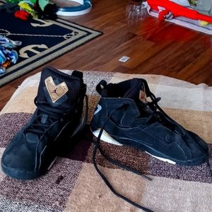 Black Jordan's with gold and white